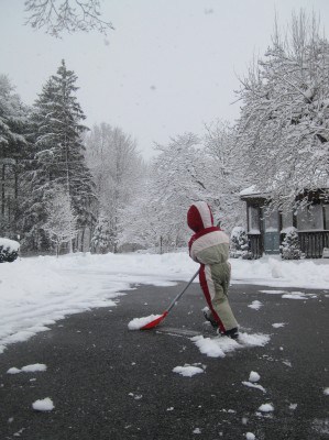 boy shoveling snow 1
