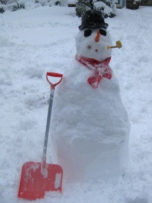 snowman with pipe and shovel