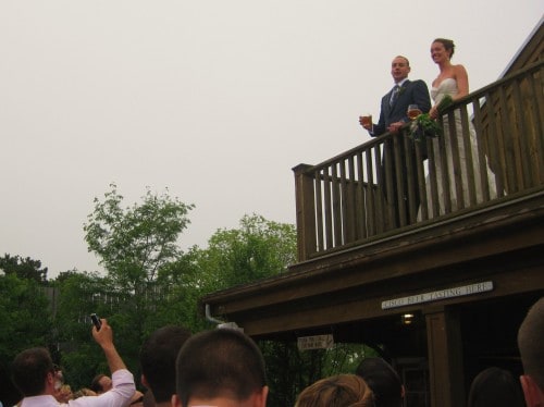 Bride and groom on balcony, Cisco brewery, Nantucket, wedding