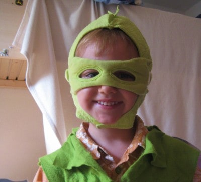 boy in selfmade dragon costume