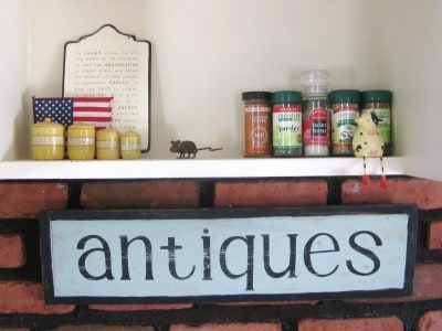 antique sign in kitchen