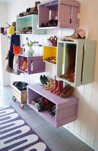 painted crates hung on wall for clever storage