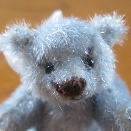 tiny blue teddy bear