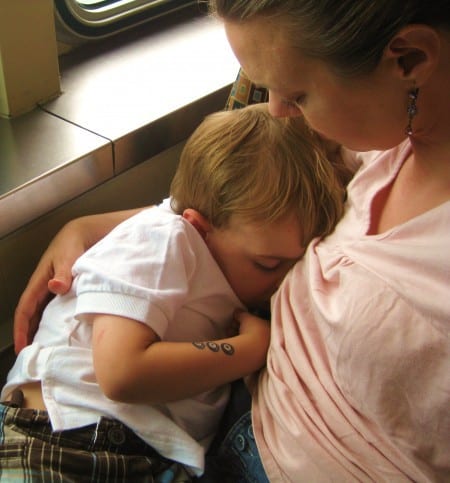 mom nursing preschooler in public on a ferry, extended breastfeeding, attachment parenting